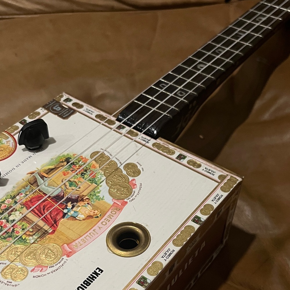 Unique Cigar Box Guitar with Colorful Design - Picture 3 of 4